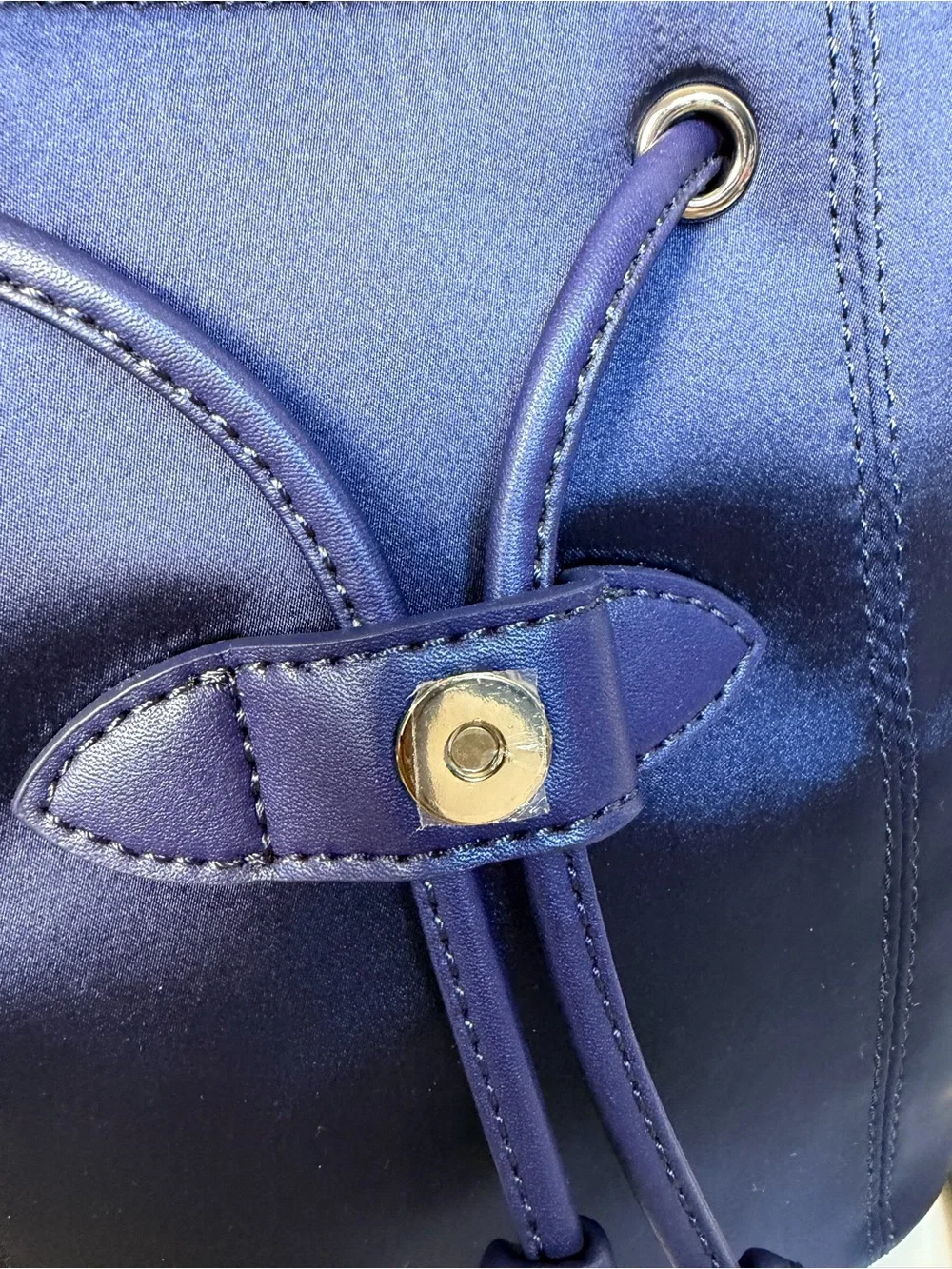 Charles & Keith Sapphire Satin Mini Backpack with Crystal Buckle